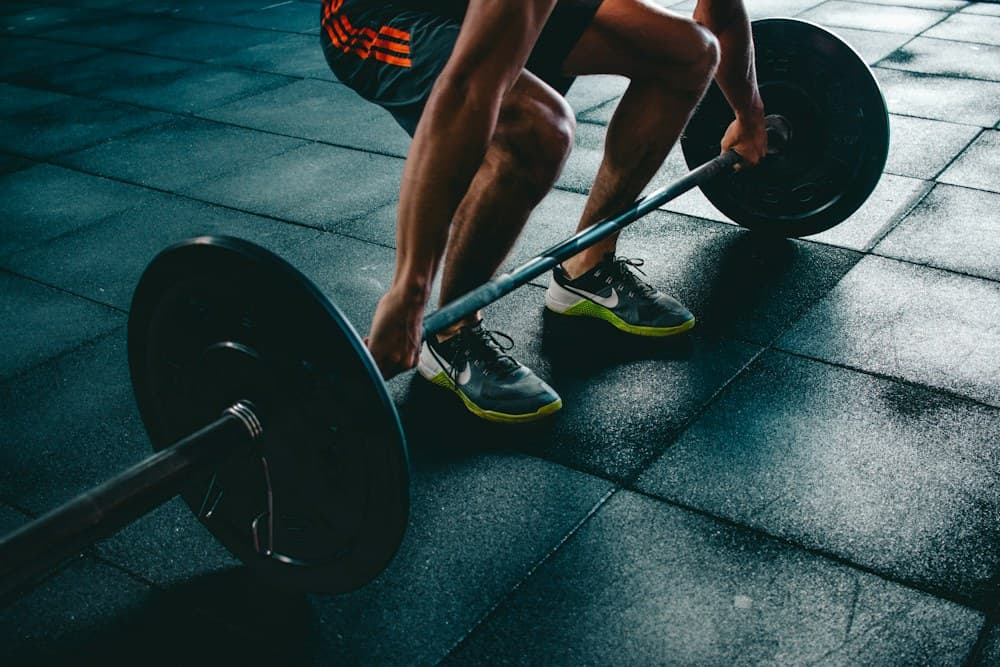 Athlete focused on a strength session in the gym