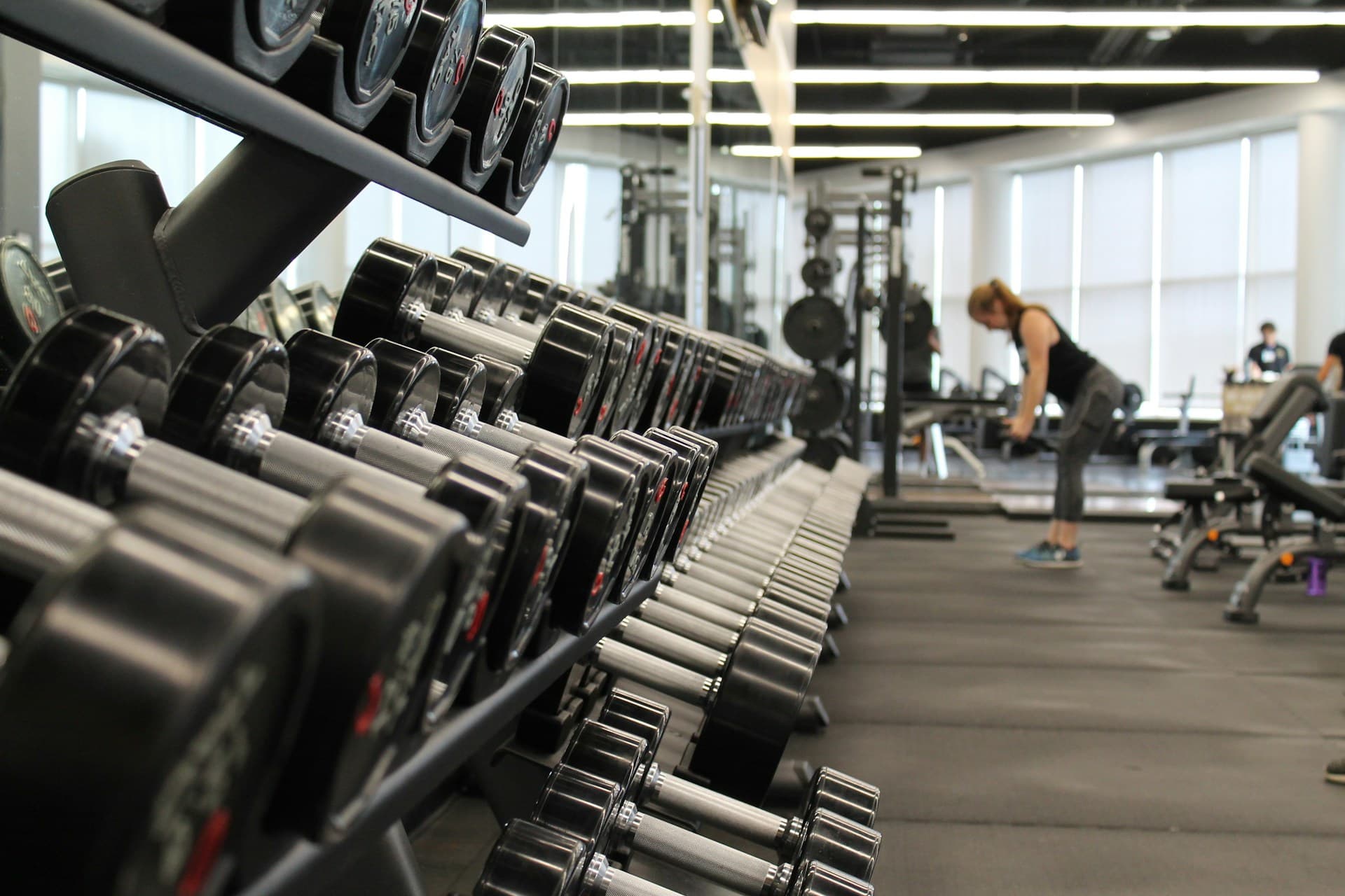 Open training floor with strength equipment and space to move